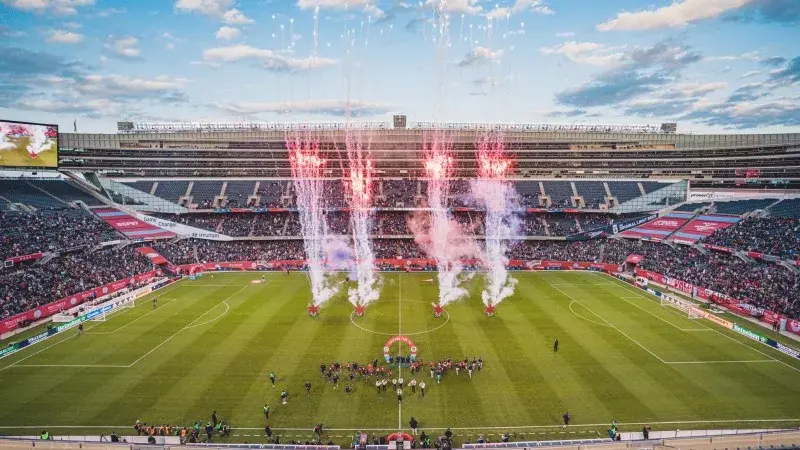 Fireworks erupting over the pitch at Soldier Field during a Chicago Fire MLS match