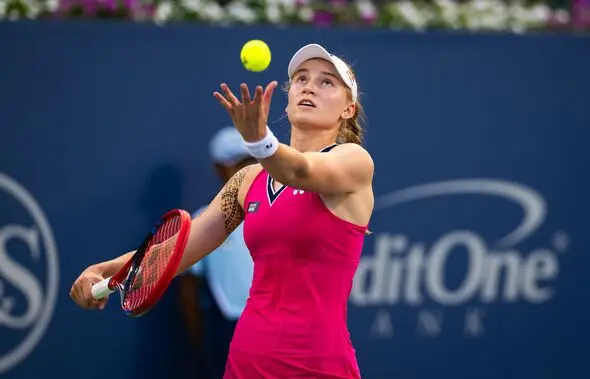 Elena Rybakina tossing a tennis ball during a match at the Cincinnati Open
