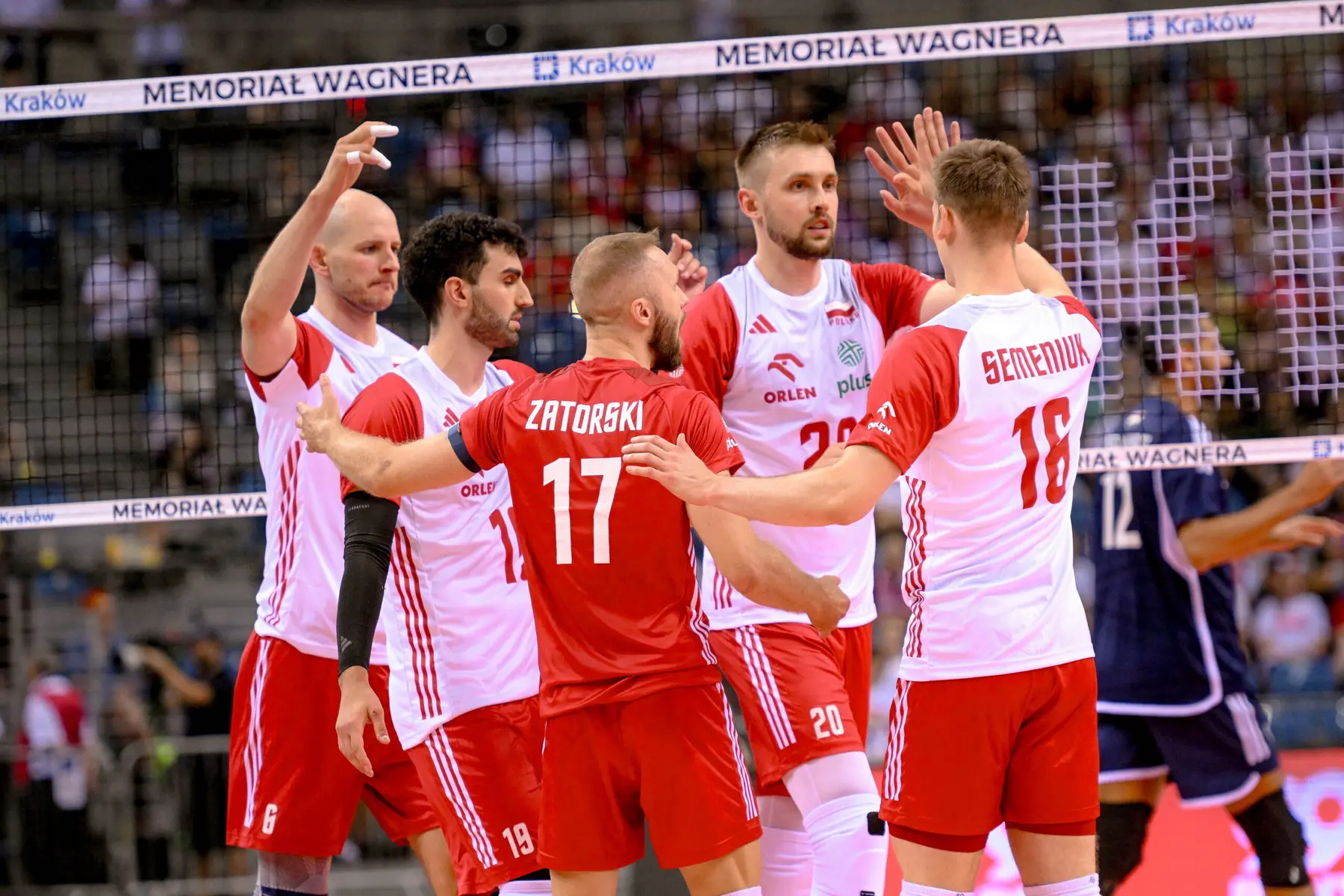 Polish national volleyball team players celebrating during the Memoriał Wagnera tournament